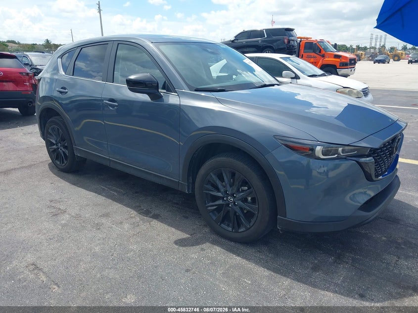 2023 Mazda Cx-5 VIN JM3KFBCM5P0205008 IAAI salvage auction — SIDE, Salvage Title, sold $7,600 on 2026-09-02 (photo 1)