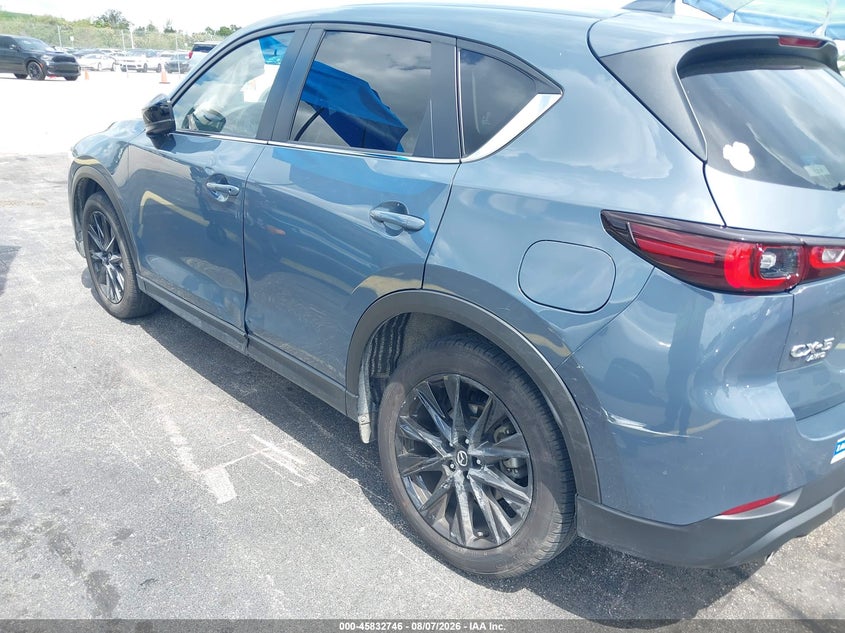 2023 Mazda Cx-5 VIN JM3KFBCM5P0205008 IAAI salvage auction — SIDE, Salvage Title, sold $7,600 on 2026-09-02 (photo 6)