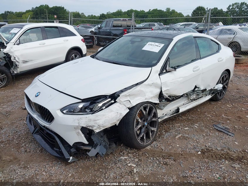 2026 BMW 2er VIN WBA83GG06T7T70984 IAAI salvage auction — SIDE, Salvage Title, sold $9,600 on 2026-10-23 (photo 2)