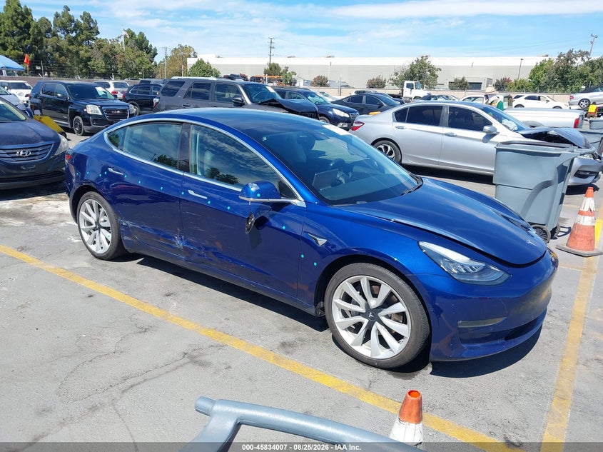 2019 Tesla Model 3 VIN 5YJ3E1EB8KF197504 — IAAI salvage auction photo
