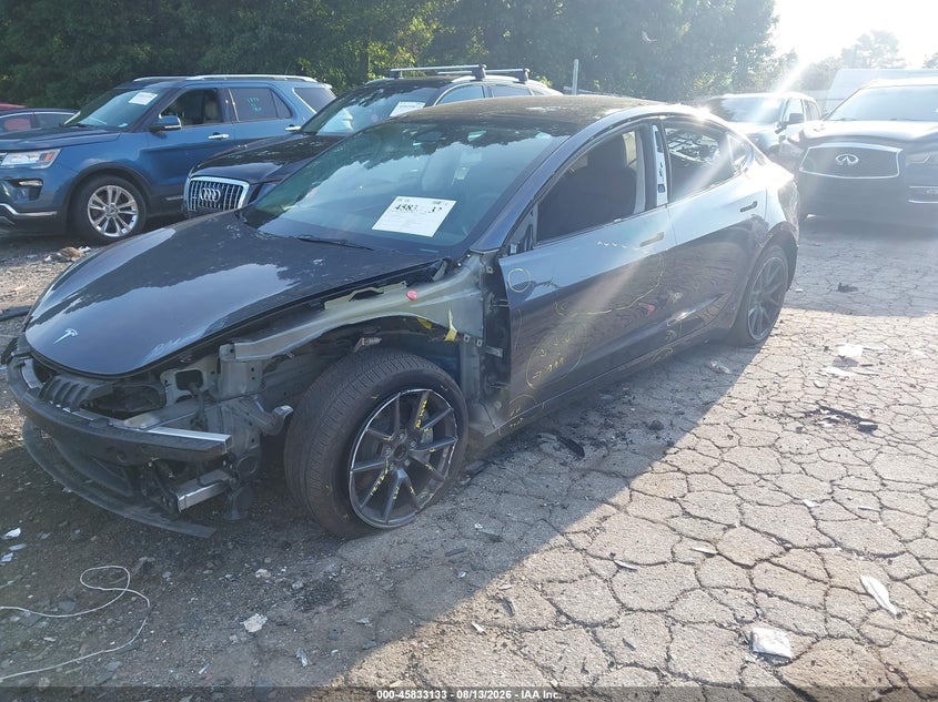 2023 Tesla Model 3 VIN 5YJ3E1EA0PF699003 IAAI salvage auction — REAR END, Salvage Title, sold $6,600 on 2026-08-30 (photo 2)