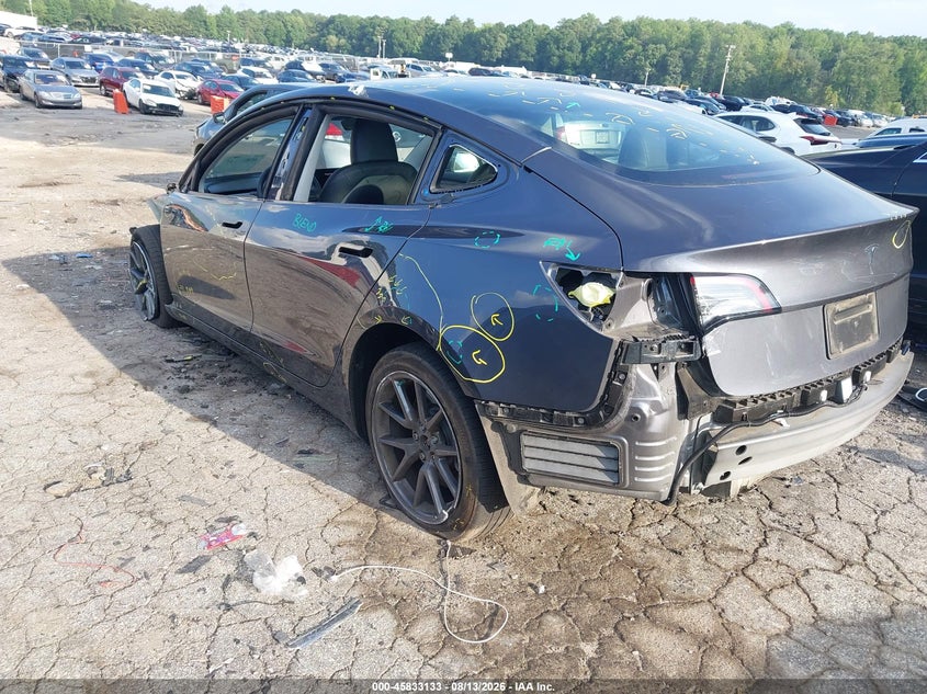 2023 Tesla Model 3 VIN 5YJ3E1EA0PF699003 IAAI salvage auction — REAR END, Salvage Title, sold $6,600 on 2026-08-30 (photo 3)