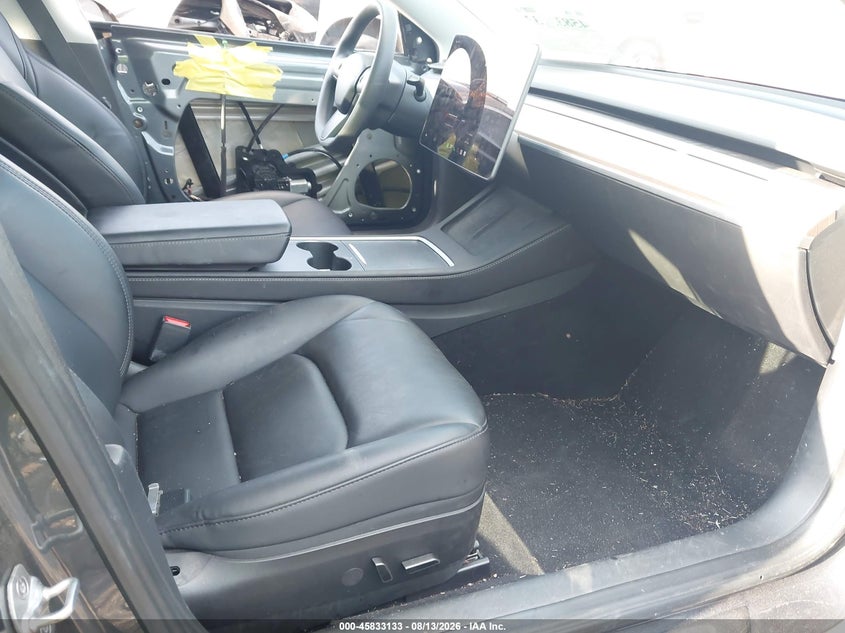 2023 Tesla Model 3 VIN 5YJ3E1EA0PF699003 IAAI salvage auction — REAR END, Salvage Title, sold $6,600 on 2026-08-30 (photo 5)