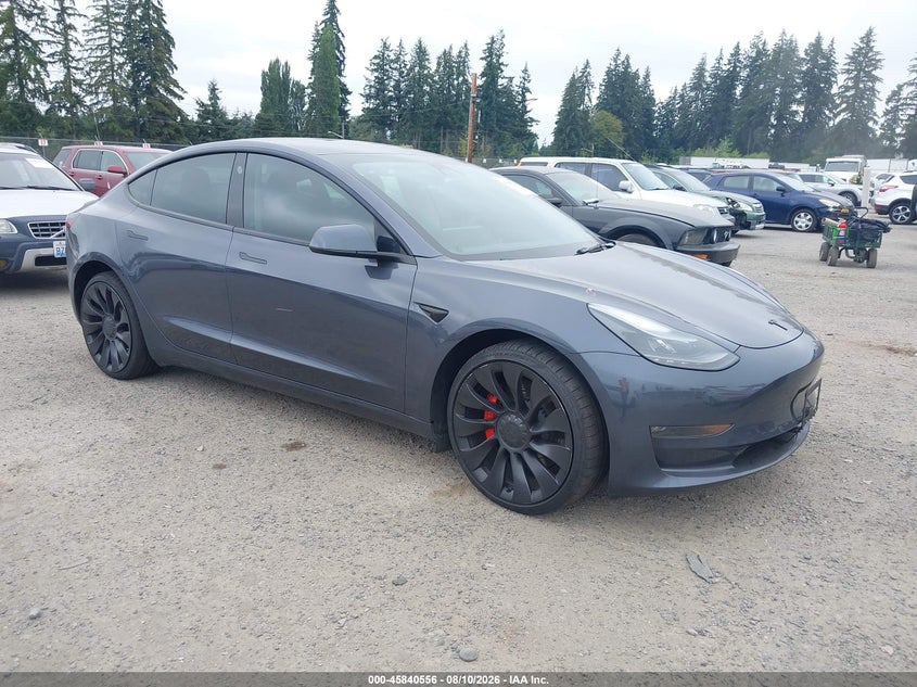 2023 Tesla Model 3 VIN 5YJ3E1EC3PF476763 — IAAI salvage auction photo