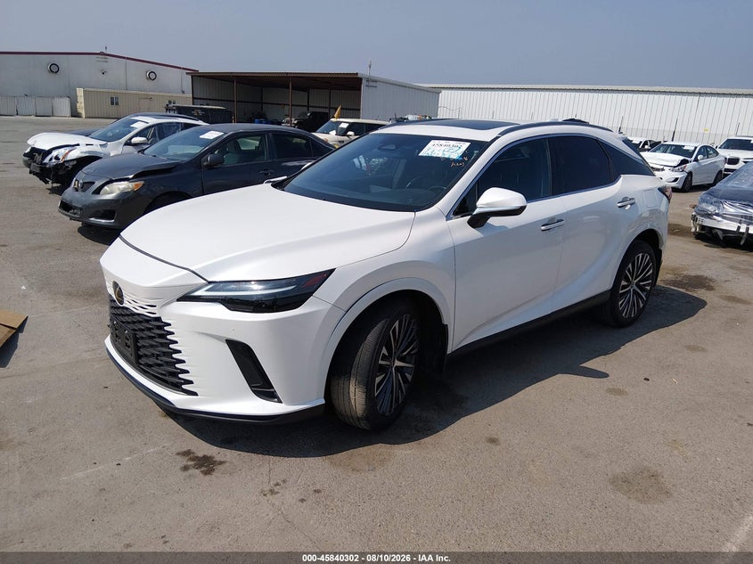 2023 Lexus Rx VIN JTJCHMAA8P2004586 IAAI salvage auction — RIGHT FRONT, Salvage (California), sold $22,175 on 2026-08-31 (photo 2)