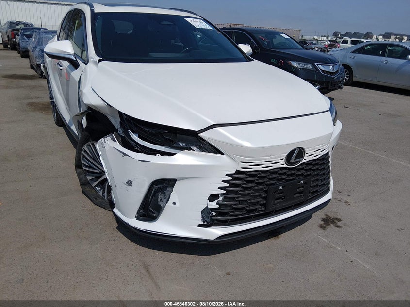 2023 Lexus Rx VIN JTJCHMAA8P2004586 IAAI salvage auction — RIGHT FRONT, Salvage (California), sold $22,175 on 2026-08-31 (photo 6)