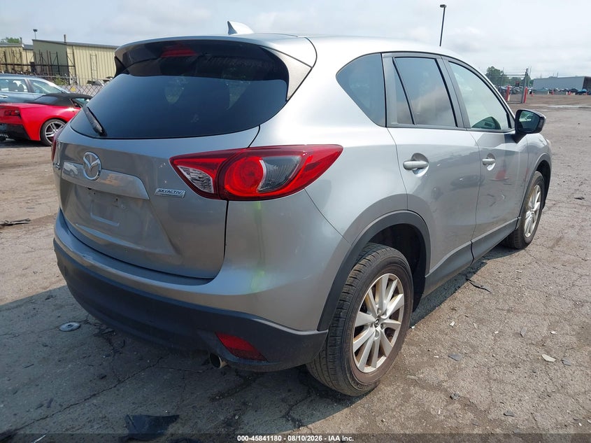 2014 Mazda Cx-5 VIN JM3KE2CYXE0314020 IAAI salvage auction — LEFT REAR, Previous Salvage (Michigan), sold $4,000 on 2026-09-01 (photo 4)