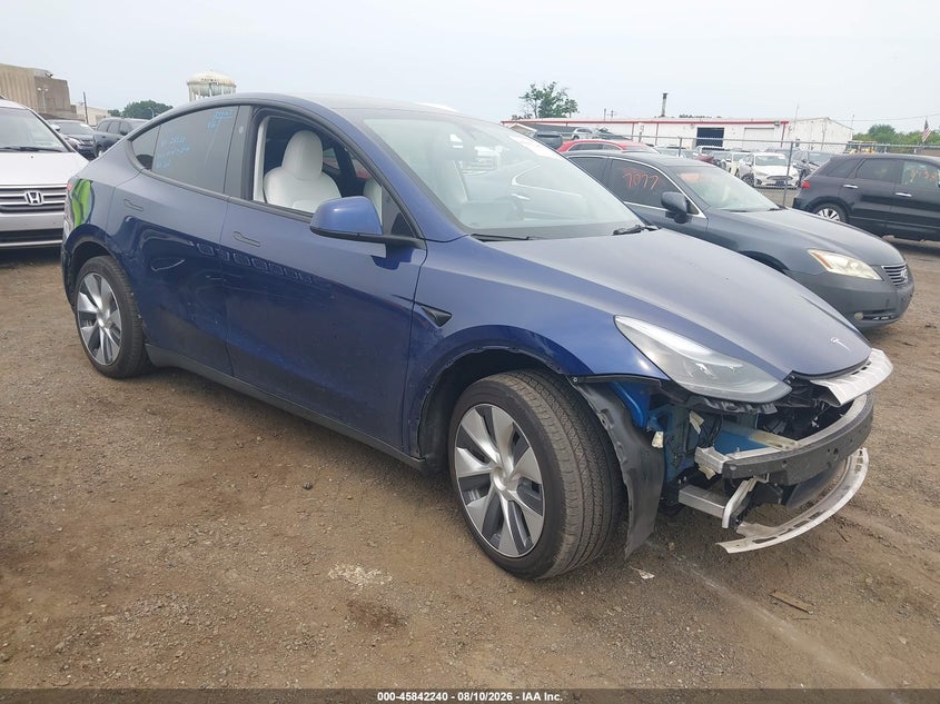 2023 Tesla Model y VIN 7SAYGDEE0PF844578 — IAAI salvage auction photo