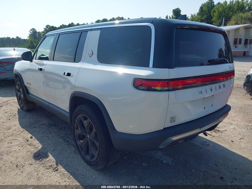 2023 Rivian R1s VIN 7PDSGABA9PN010385 IAAI salvage auction — SIDE, Wait Title, sold $18,000 on 2026-10-01 (photo 3)