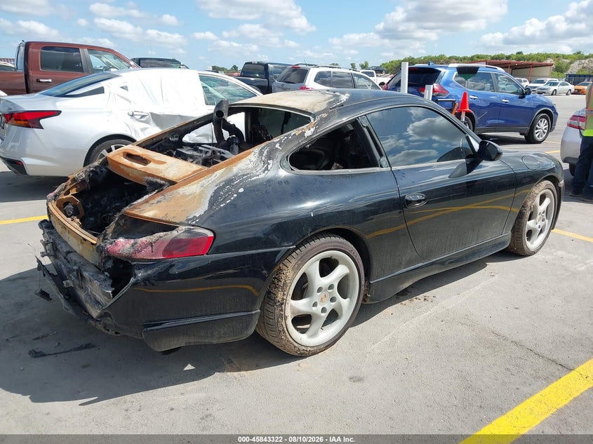 2000 Porsche 911 VIN WP0AA2999YS621171 IAAI salvage auction — ENGINE BURN, Clear (Texas), sold $800 on 2026-08-13 (photo 4)