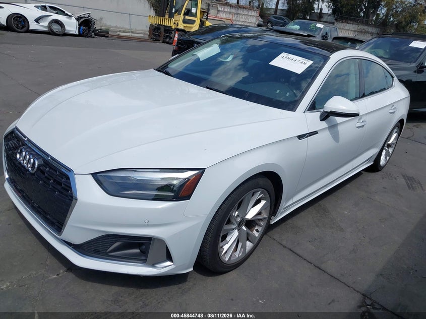 2022 Audi A5 VIN WAUABCF53NA013438 IAAI salvage auction — SIDE, Salvage Title, sold $9,400 on 2026-08-26 (photo 2)