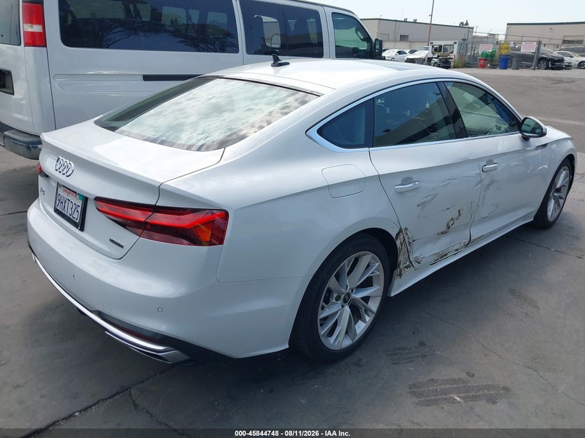 2022 Audi A5 VIN WAUABCF53NA013438 IAAI salvage auction — SIDE, Salvage Title, sold $9,400 on 2026-08-26 (photo 4)