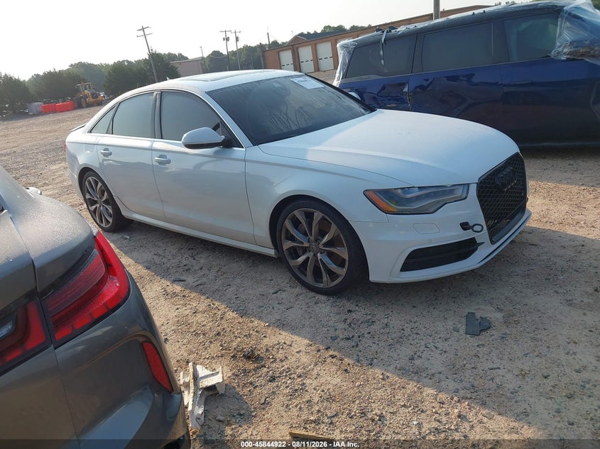 2015 Audi A6 VIN WAUHGAFC7FN010734 IAAI salvage auction — WATER/FLOOD, Salvage (North Carolina), sold $1,975 on 2026-09-21 (photo 1)