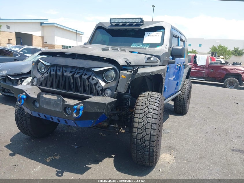 2016 Jeep Wrangler / VIN 1C4BJWDG1GL215315 IAAI salvage auction — UNDERCARRIAGE, Wait Title, sold $5,600 on 2026-08-23 (photo 2)