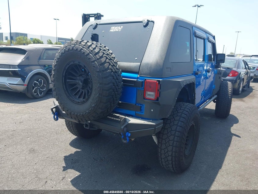 2016 Jeep Wrangler / VIN 1C4BJWDG1GL215315 IAAI salvage auction — UNDERCARRIAGE, Wait Title, sold $5,600 on 2026-08-23 (photo 4)