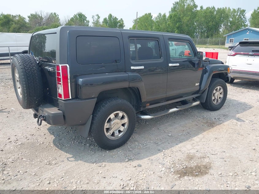 2009 Hummer H3 VIN 5GTEN13E498117883 IAAI salvage auction — STORM DAMAGE, Clear (Wisconsin), sold $525 on 2026-09-03 (photo 4)
