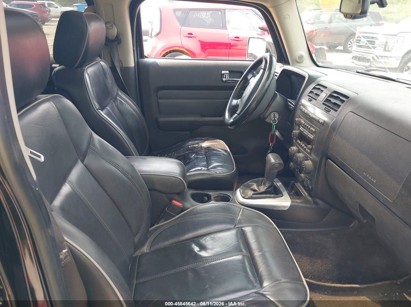 2009 Hummer H3 VIN 5GTEN13E498117883 IAAI salvage auction — STORM DAMAGE, Clear (Wisconsin), sold $525 on 2026-09-03 (photo 5)