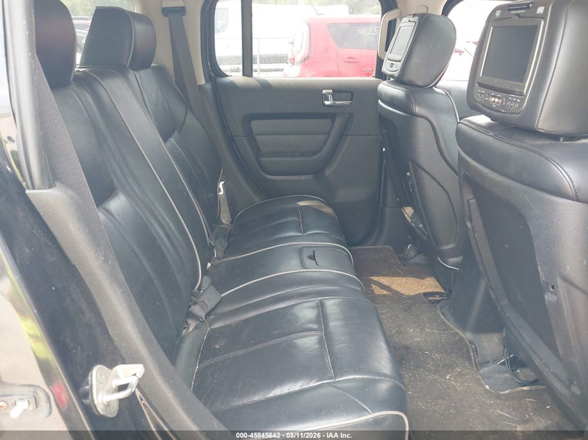 2009 Hummer H3 VIN 5GTEN13E498117883 IAAI salvage auction — STORM DAMAGE, Clear (Wisconsin), sold $525 on 2026-09-03 (photo 8)