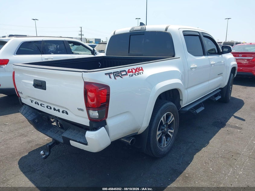 2018 Toyota Tacoma VIN 3TMCZ5ANXJM173274 IAAI salvage auction — REAR END, Salvage Title, sold $9,500 on 2026-08-30 (photo 4)