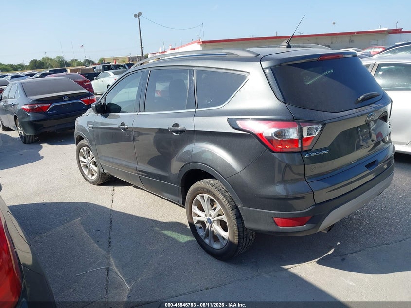 2018 Ford Escape VIN 1FMCU0GDXJUD58884 IAAI salvage auction — NORMAL WEAR, Original (Texas), sold $1,700 on 2026-08-19 (photo 3)