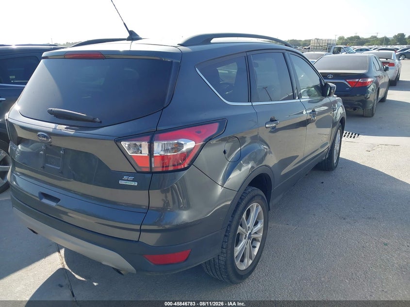 2018 Ford Escape VIN 1FMCU0GDXJUD58884 IAAI salvage auction — NORMAL WEAR, Original (Texas), sold $1,700 on 2026-08-19 (photo 4)