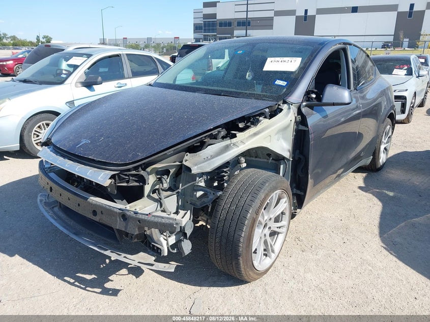 2023 Tesla Model y VIN 7SAYGDED3PF943922 IAAI salvage auction — FRONT END, Wait Title, sold $11,300 on 2026-10-10 (photo 2)