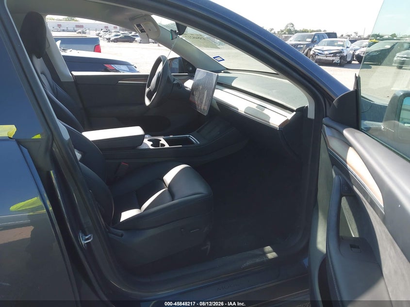 2023 Tesla Model y VIN 7SAYGDED3PF943922 IAAI salvage auction — FRONT END, Wait Title, sold $11,300 on 2026-10-10 (photo 5)