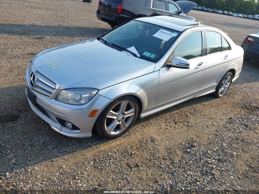 2010 Mercedes-benz C class VIN WDDGF8BB2AR106415 IAAI salvage auction — FRONT & REAR, Clear (New York), sold $450 on 2026-08-18 (photo 2)
