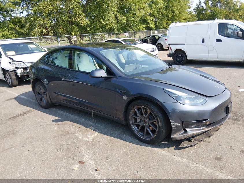 2023 Tesla Model 3 VIN 5YJ3E1EB1PF632676 — IAAI salvage auction photo
