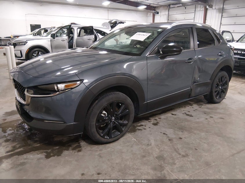 2023 Mazda Cx-30 VIN 3MVDMBCM7PM551113 IAAI salvage auction — SIDE, Salvage Title, sold $9,000 on 2026-08-30 (photo 2)