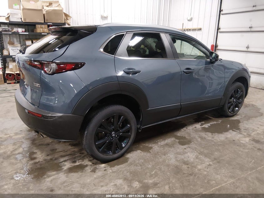 2023 Mazda Cx-30 VIN 3MVDMBCM7PM551113 IAAI salvage auction — SIDE, Salvage Title, sold $9,000 on 2026-08-30 (photo 4)