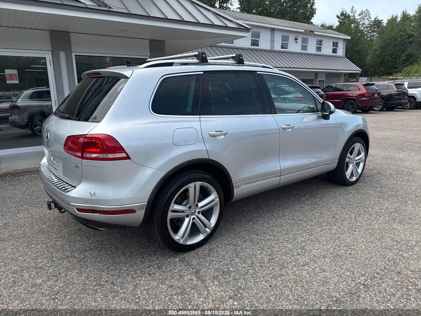 2017 Volkswagen Touareg VIN WVGGF7BP8HD001557 IAAI salvage auction — NORMAL WEAR, Salvage Title, sold $7,000 on 2026-09-23 (photo 4)