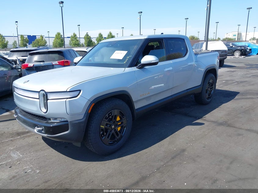 2024 Rivian R1t VIN 7FCTGAAL8RN032163 IAAI salvage auction — SIDE, Wait Title, sold $19,700 on 2026-10-02 (photo 2)