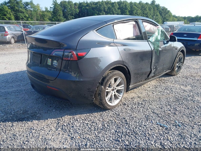 2024 Tesla Model y VIN 7SAYGDEE1RF986408 IAAI salvage auction — FRONT END, Salvage Title, sold $11,600 on 2026-08-30 (photo 4)