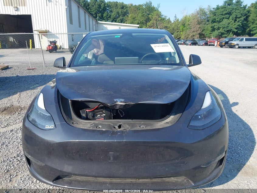 2024 Tesla Model y VIN 7SAYGDEE1RF986408 IAAI salvage auction — FRONT END, Salvage Title, sold $11,600 on 2026-08-30 (photo 6)