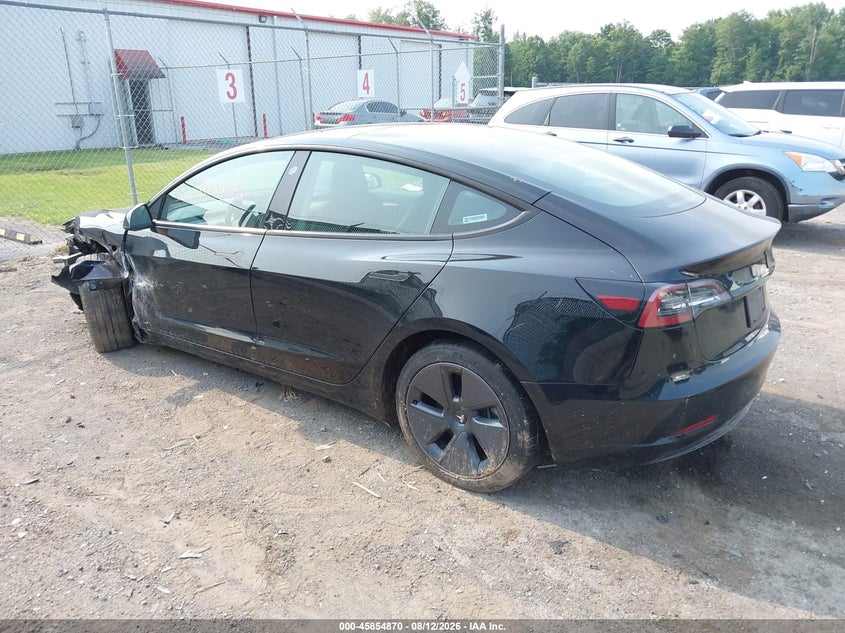 2023 Tesla Model 3 VIN 5YJ3E1EA3PF579440 IAAI salvage auction — LEFT FRONT, Mv-907A (New York), sold $7,100 on 2026-08-23 (photo 3)