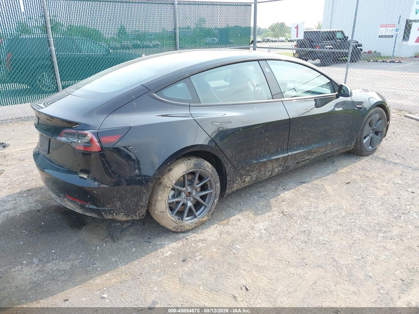 2023 Tesla Model 3 VIN 5YJ3E1EA3PF579440 IAAI salvage auction — LEFT FRONT, Mv-907A (New York), sold $7,100 on 2026-08-23 (photo 4)