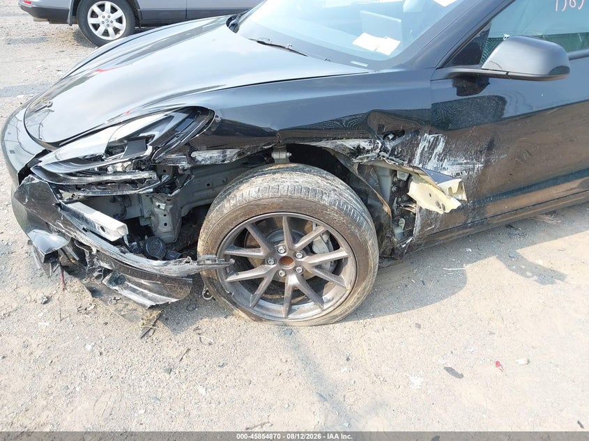 2023 Tesla Model 3 VIN 5YJ3E1EA3PF579440 IAAI salvage auction — LEFT FRONT, Mv-907A (New York), sold $7,100 on 2026-08-23 (photo 6)