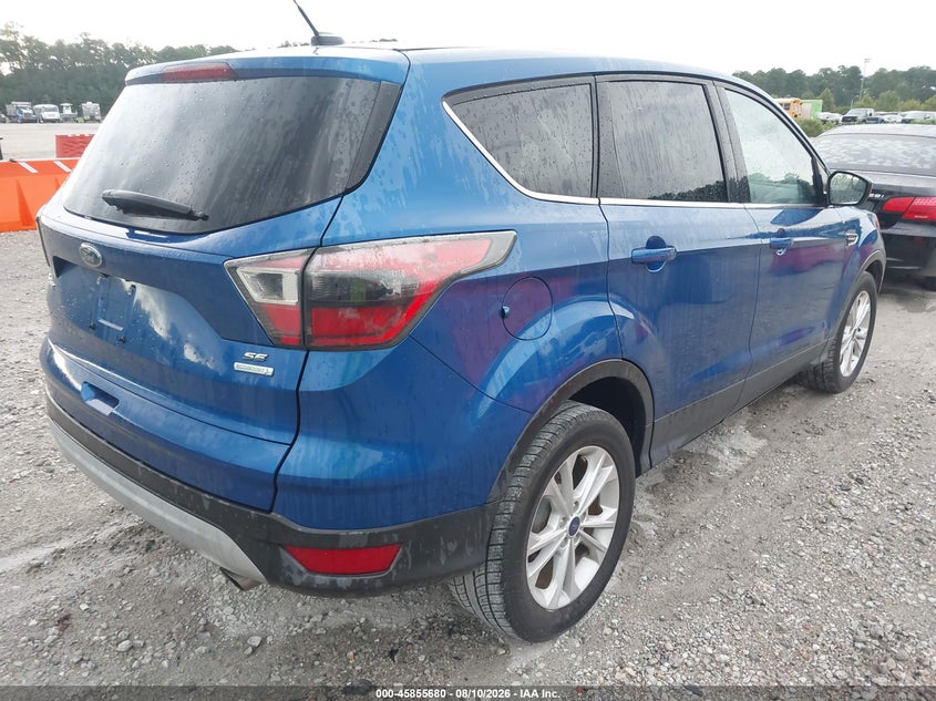 2017 Ford Escape VIN 1FMCU0GD8HUB21000 IAAI salvage auction — NORMAL WEAR, Salvage Title, sold $1,600 on 2026-09-06 (photo 4)