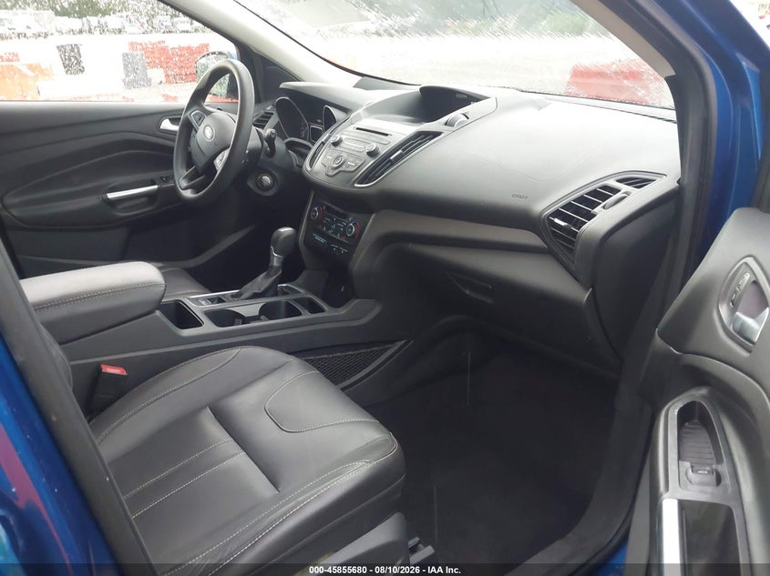 2017 Ford Escape VIN 1FMCU0GD8HUB21000 IAAI salvage auction — NORMAL WEAR, Salvage Title, sold $1,600 on 2026-09-06 (photo 5)