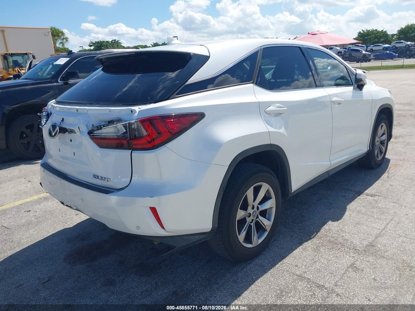 2019 Lexus Rx VIN 2T2ZZMCA4KC140386 IAAI salvage auction — REAR END, Salvage Title, sold $19,400 on 2026-09-10 (photo 4)