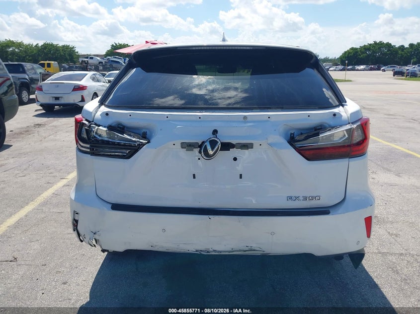 2019 Lexus Rx VIN 2T2ZZMCA4KC140386 IAAI salvage auction — REAR END, Salvage Title, sold $19,400 on 2026-09-10 (photo 6)