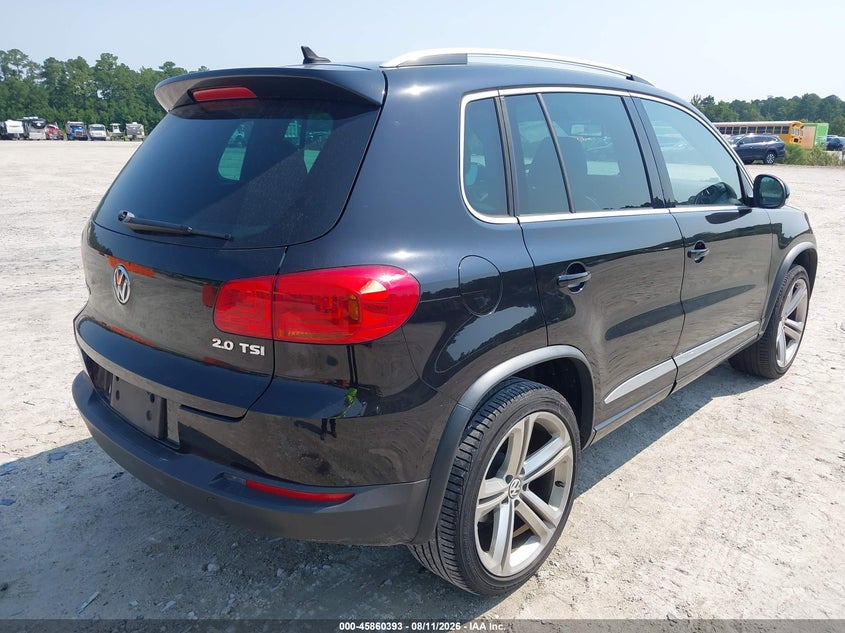 2014 Volkswagen Tiguan VIN WVGAV3AXXEW012949 IAAI salvage auction — NORMAL WEAR, Salvage Title, sold $2,450 on 2026-08-18 (photo 4)