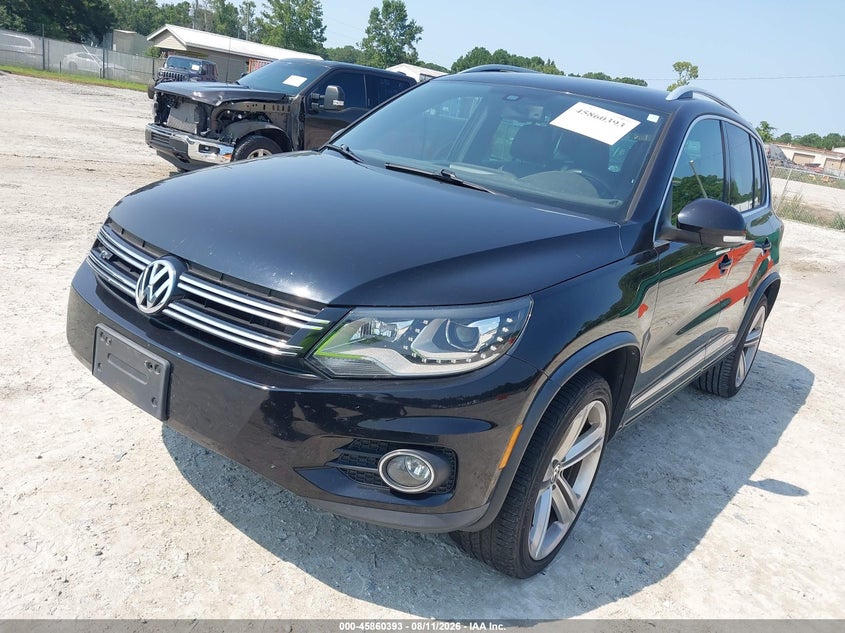 2014 Volkswagen Tiguan VIN WVGAV3AXXEW012949 IAAI salvage auction — NORMAL WEAR, Salvage Title, sold $2,450 on 2026-08-18 (photo 6)