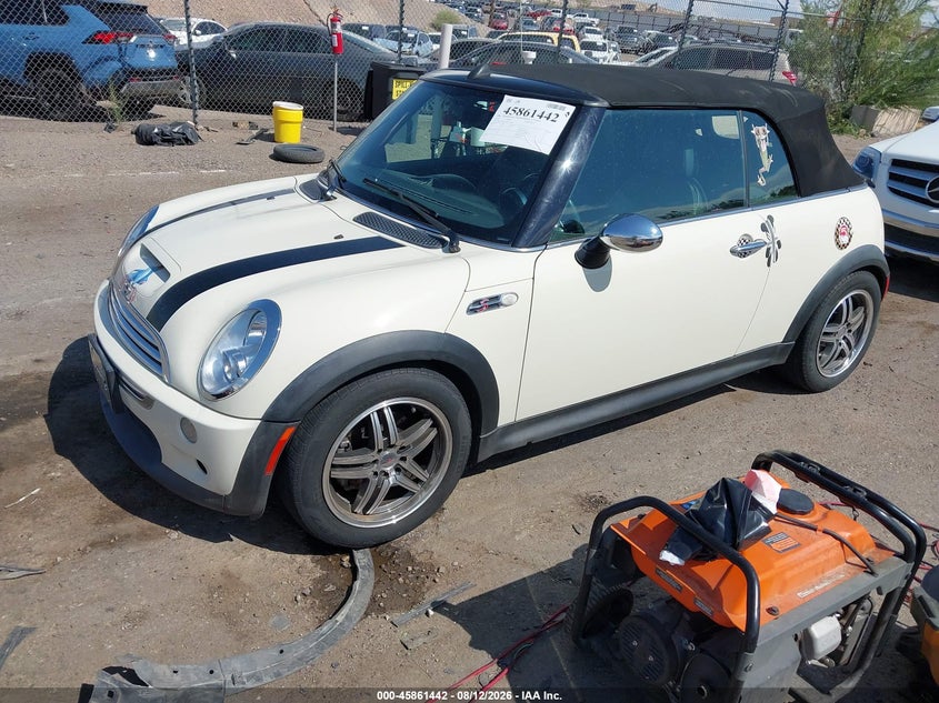 2006 Mini Cooper VIN WMWRH33566TK59041 IAAI salvage auction — NORMAL WEAR, Clear (New Mexico), sold $1,050 on 2026-08-17 (photo 2)