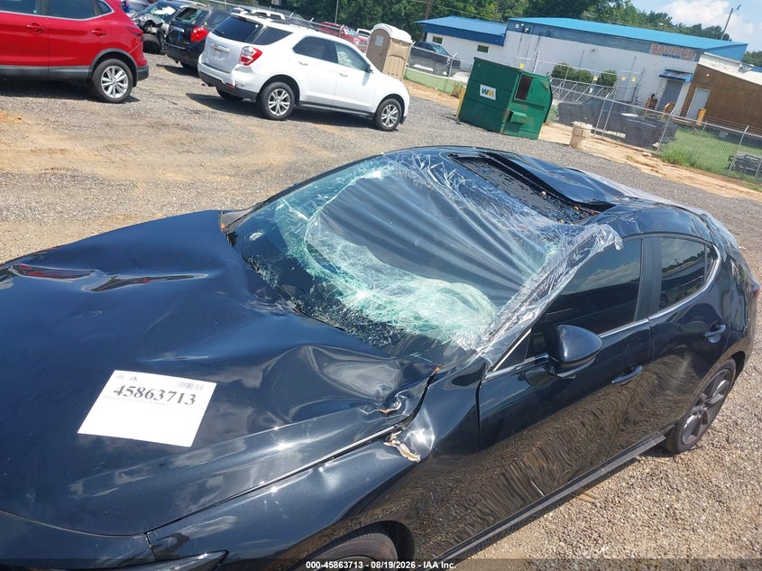 2026 Mazda 3 VIN JM1BPALL2T1850288 IAAI salvage auction — STORM DAMAGE, Wait Title, sold $2,650 on 2026-10-21 (photo 6)