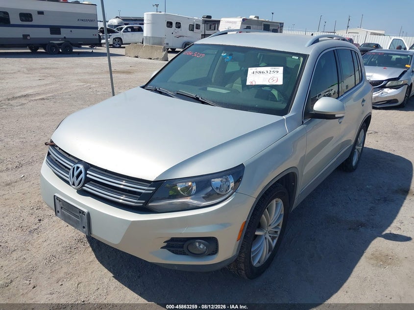 2013 Volkswagen Tiguan VIN WVGAV7AX8DW536316 IAAI salvage auction — SIDE, Original (Texas), sold $1,300 on 2026-08-19 (photo 2)
