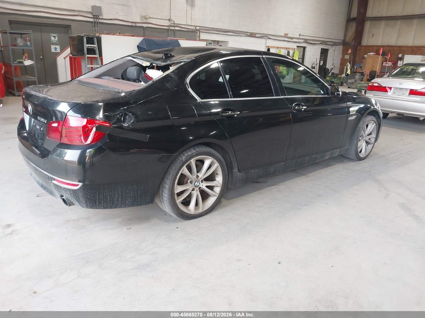 2014 BMW 5 series VIN WBA5B3C50ED531320 IAAI salvage auction — STORM DAMAGE, Clear (Montana), sold $700 on 2026-08-19 (photo 4)