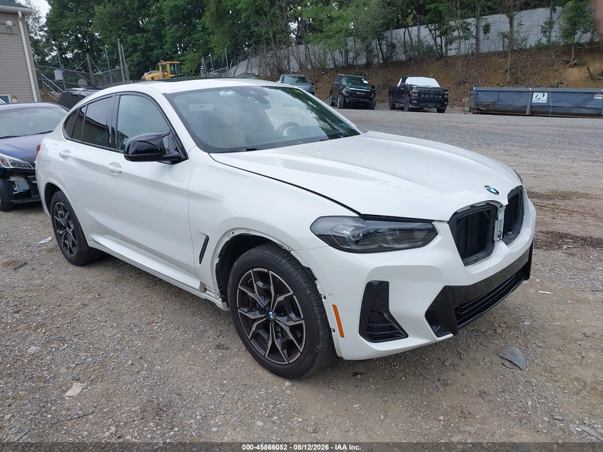 2024 BMW X4 VIN 5UX43DT02R9U60585 IAAI salvage auction — SIDE, Salvage Title, sold $22,600 on 2026-08-22 (photo 1)