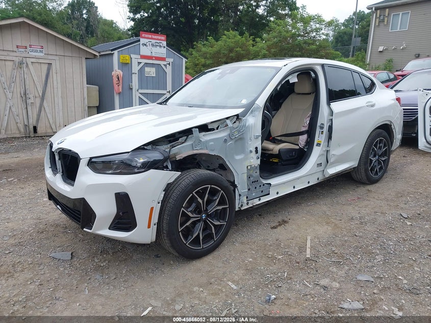 2024 BMW X4 VIN 5UX43DT02R9U60585 IAAI salvage auction — SIDE, Salvage Title, sold $22,600 on 2026-08-22 (photo 2)
